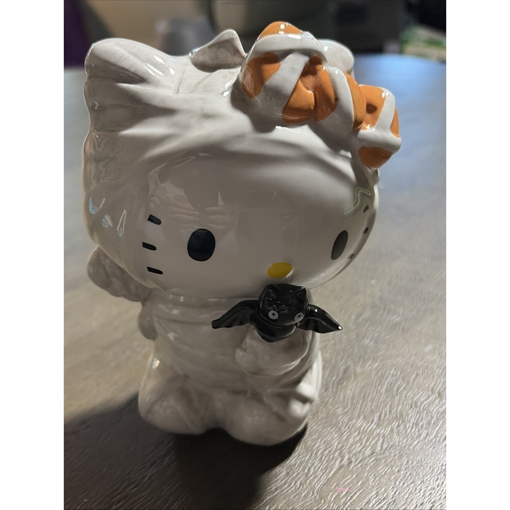 Blue Sky Clayworks Hello Kitty Mummy with Bat Ceramic Halloween Figurine 6.5"